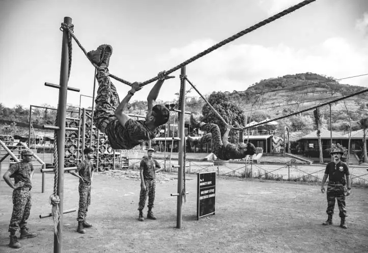 Military style obstacle course training at Della Adventure Training Academy