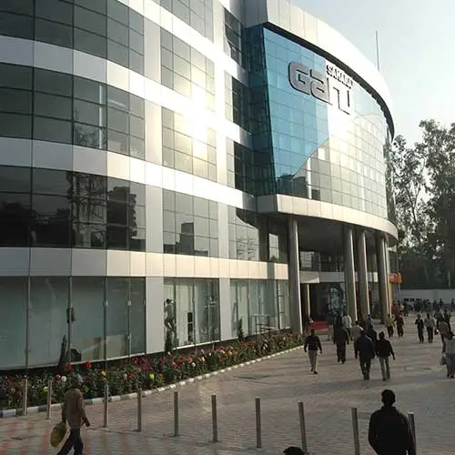 Evening exterior view of Sahara Ganj shopping mall designed by Jimmy Mistry
