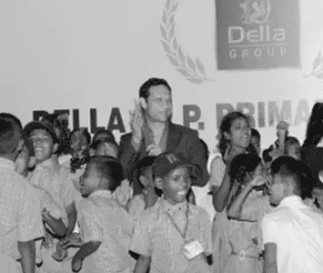 Jimmy Mistry with students at Della ZP School community initiative