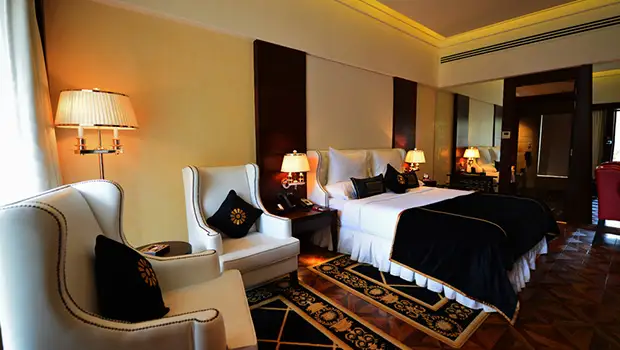 Luxury bedroom interior at Della Resorts Lonavala