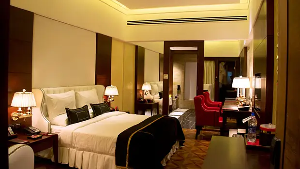 Premium resort bedroom interior at Della Resorts in Lonavala