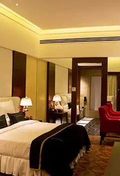 Premium resort bedroom interior at Della Resorts in Lonavala